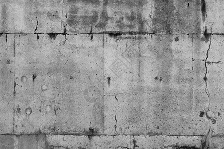 灰色混凝土墙的裂缝图片