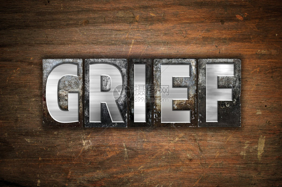 Grief这个词是用古老的金属纸质印刷图片
