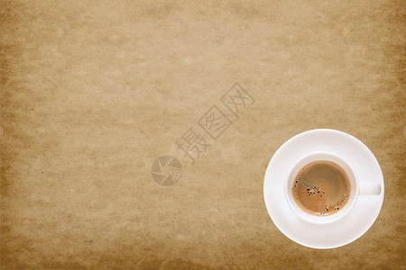 在旧纸质背景的咖啡杯上添加文字的带有空间的图片