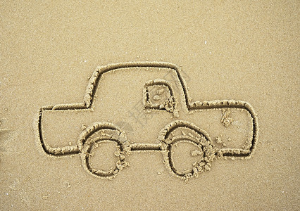 画在沙子里的汽车图片