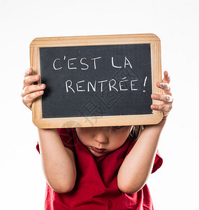 惊慌失措的小孩躲在法语写作计划下面图片