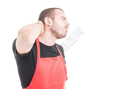 年青超市卖家将脖子疼痛作为医疗问题概念图片