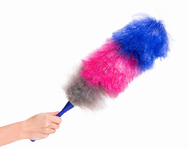 手持扫帚用于清洁或带塑料手柄的软彩色掸子背景图片