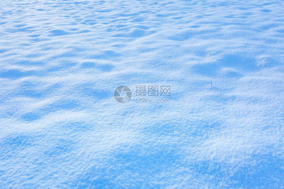 雪背景关闭田野上的新雪图片