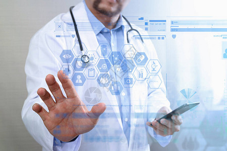 医疗技术概念医生手与具有医疗图表接口多通道连接白色背景的现代智能图片