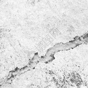 奥曼沙漠中破碎的沙石裂开的黑白近身镜图片