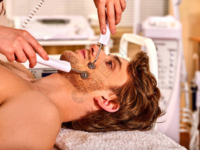 男面部按摩美容院电动刺激男子皮肤护理专业设备微流升脸孔内科室抗老化非外科手术复图片