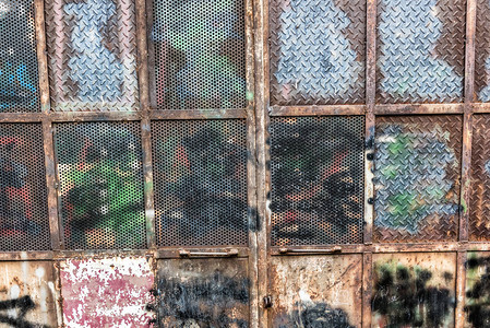 金属门板纹理和背景金属表面锈迹斑生锈的金属垃圾背图片