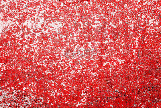 红色剥落油漆的纹理背景图片
