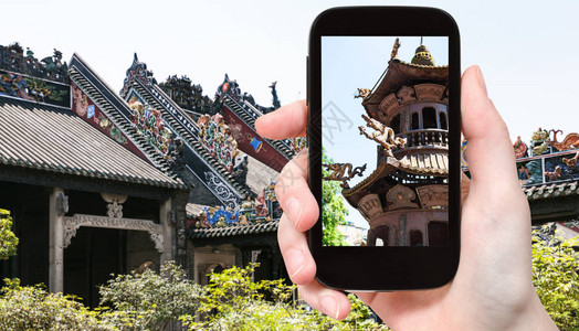 广州陈家祠堂游客在广州市光孝佛寺背景