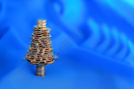 带金币的快乐圣诞树商业隐喻图片
