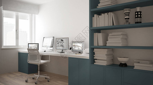 极简主义房屋中的现代工作场所带电脑的办公桌大书架舒适的白色和蓝色图片