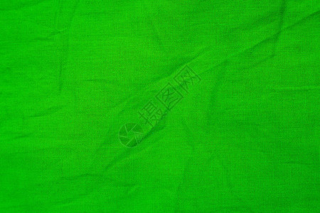 皱巴的绿色织物纹理图片