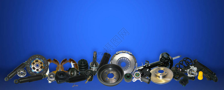 蓝色背景集上的备件汽车许多汽车零件都位于图像的边缘OEM零件图片