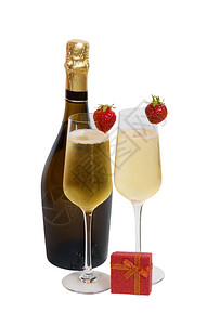 两杯香槟一瓶香槟和红色礼物盒白本孤图片