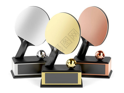 白色背景的乒乓球金银铜奖杯图片