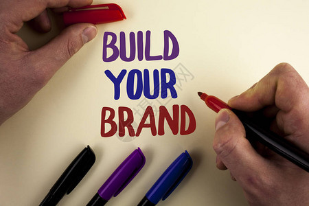 构筑您的品牌概念照片创建了您自己的标志口号广告营销模型图片