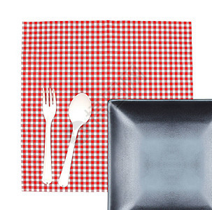 餐桌布上带有叉和勺子的顶端观景板背景图片