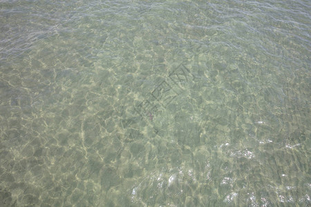 透明蓝色海平面背图片