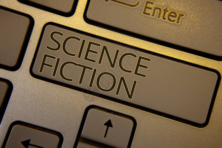 文字写作文本科幻小说幻想娱乐类型未来奇幻冒险键盘棕色键黑色字母单词意图在计算机上创建文图片