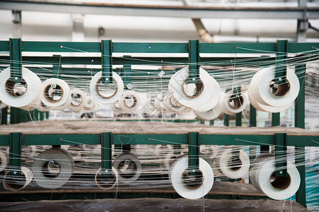 纺织业一家纺织厂在旋转背景图片