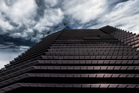 一座现代的黑色办公楼拔地而起图片