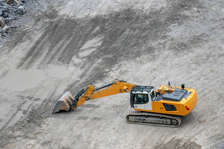 花岗岩采石场的采矿业开采机器挖图片