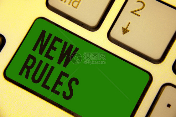 显示新规则的书写笔记商业照片展示为更好地升级而改变实施策略的状态键盘绿键意图计算机图片