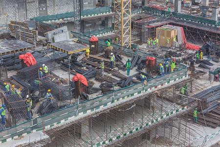 从事迪拜现代建筑工地程的劳工快速城市发展概念笑声图片