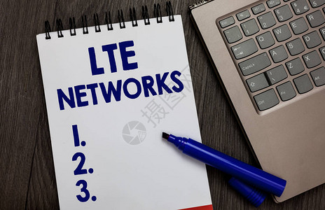 手写文本Lte网络概念含义可用于无线通信的最快网络连接打开笔记本白页黑色标记计算机背景图片