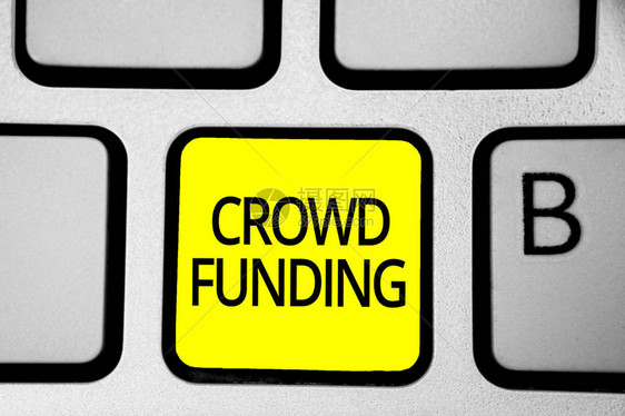 手写文字书写人群资金概念意义筹款Kickstarter启动承诺平台捐赠键盘黄色键意图创建计算机图片