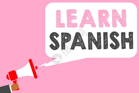 显示学习西班牙语的文字符号西班牙概念照片翻译语言词汇方言语音人手持扩音器扬声器语音气泡图片