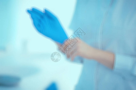 医生戴上橡胶手套不育纯洁医疗诊所图片