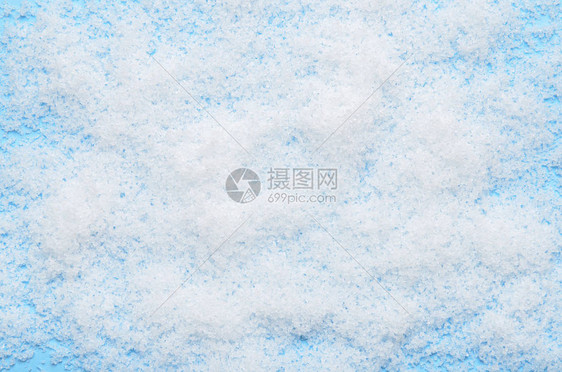 蓝色背景的白毛人造雪图片