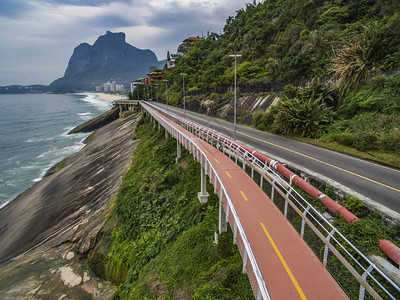 海边的高速公路美妙的道路和自行车道自行车和公路轨道图片