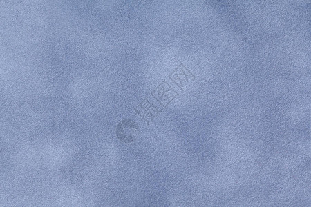 羊皮织物的浅蓝色垫底背景缝合无缝皮革图片