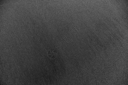 海滩上的黑沙火山纹理图片