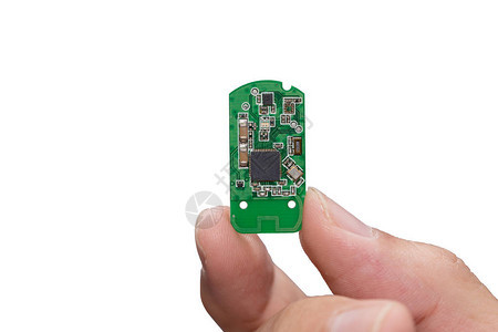 手持小电子微芯片微控制器在白图片