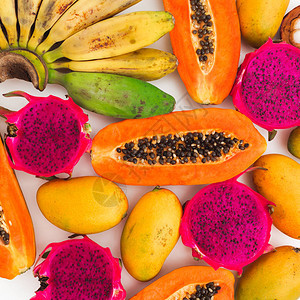 白底香蕉木瓜芒果和龙果水的水果形态图片