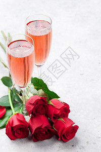 情人节的贺卡香槟和玫瑰花束您图片
