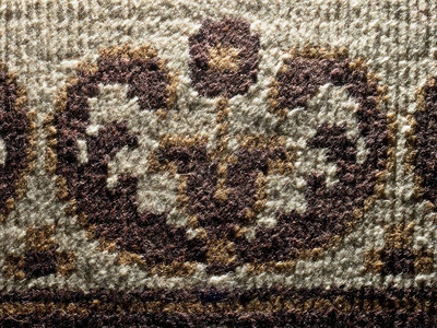旧地毯纤维的详情旧式地毯纹理近身图片