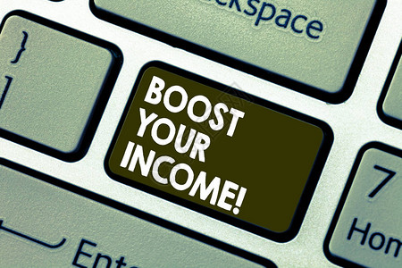 显示增加您的收入的书写笔记展示使用兼职工作增加月薪或年薪的商业照片键盘意图创建计算机消息图片
