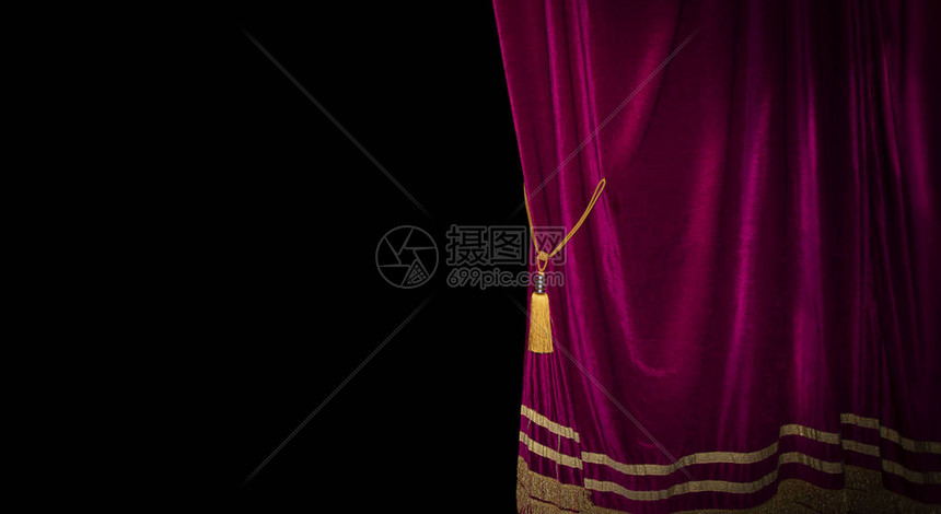 舞台的红窗帘正在为戏剧图片