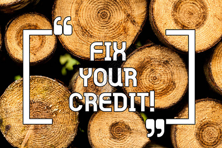 显示修复您的信用的文本符号概念照片保持信用卡和其他信用的低余额木制背景复古木材野生信息图片