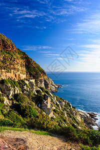 南非豪特湾开普敦蓝色小时风景宁静和浪漫的全景观和海景背景图片