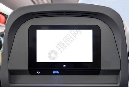 在客机后座带有按钮和频道的白色显示播放屏图片