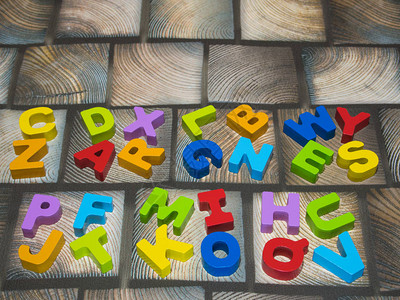 字母拼图是一个智力训练玩具Atallfigleisaintaltrainin背景图片