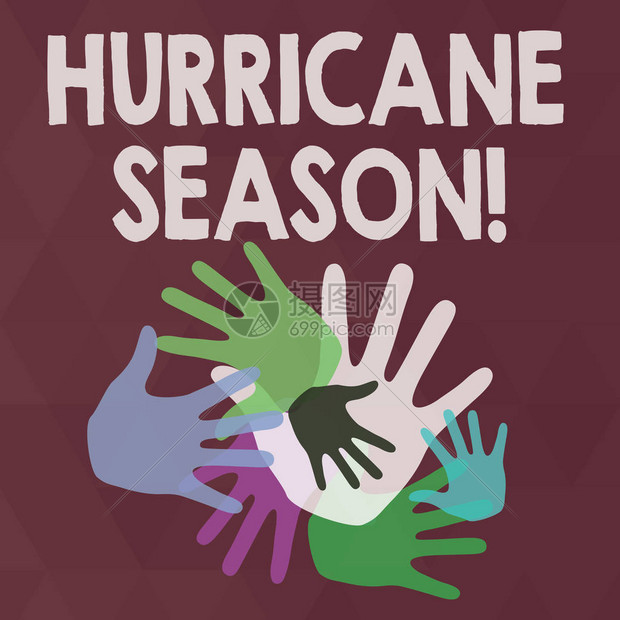 文字书写文本飓风季节商业照片展示了大多数热带气旋预计会形成不同大小的彩色手印重叠以实现团队合作和图片