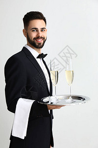 带香槟杯的服务员图片