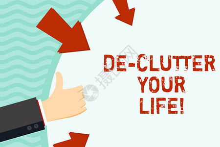 手写文字书写DeClutter你的生活概念照片从地方组织中去除杂乱图片